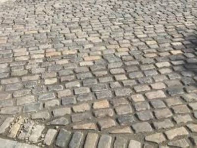 Maidstone Paving Contractors Laying Cobblestones in Maidstone